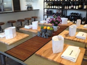 At the Intentional Table, in Winslow, your chef's hat and cutting board are ready for the hands-on cooking class with fresh Farmers' Market picks.