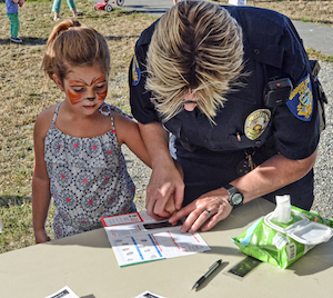 At last year's Night Out, face-painting and "fingerprinting" were two of the activities offered by Bainbridge Island police officers at National Night Out